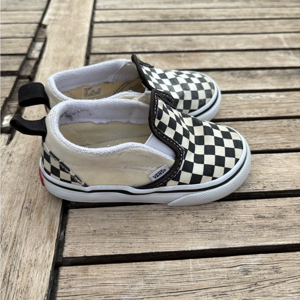 Vans Black and White Checkerboard Slip-On Sneakers